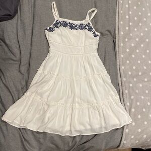 White dress with blue flower embroidery from Francesca’s. Kids size 12.